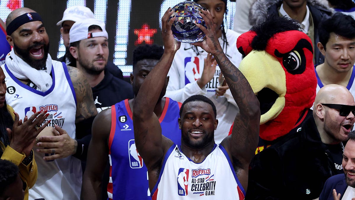 D.K. Metcalf raises trophy