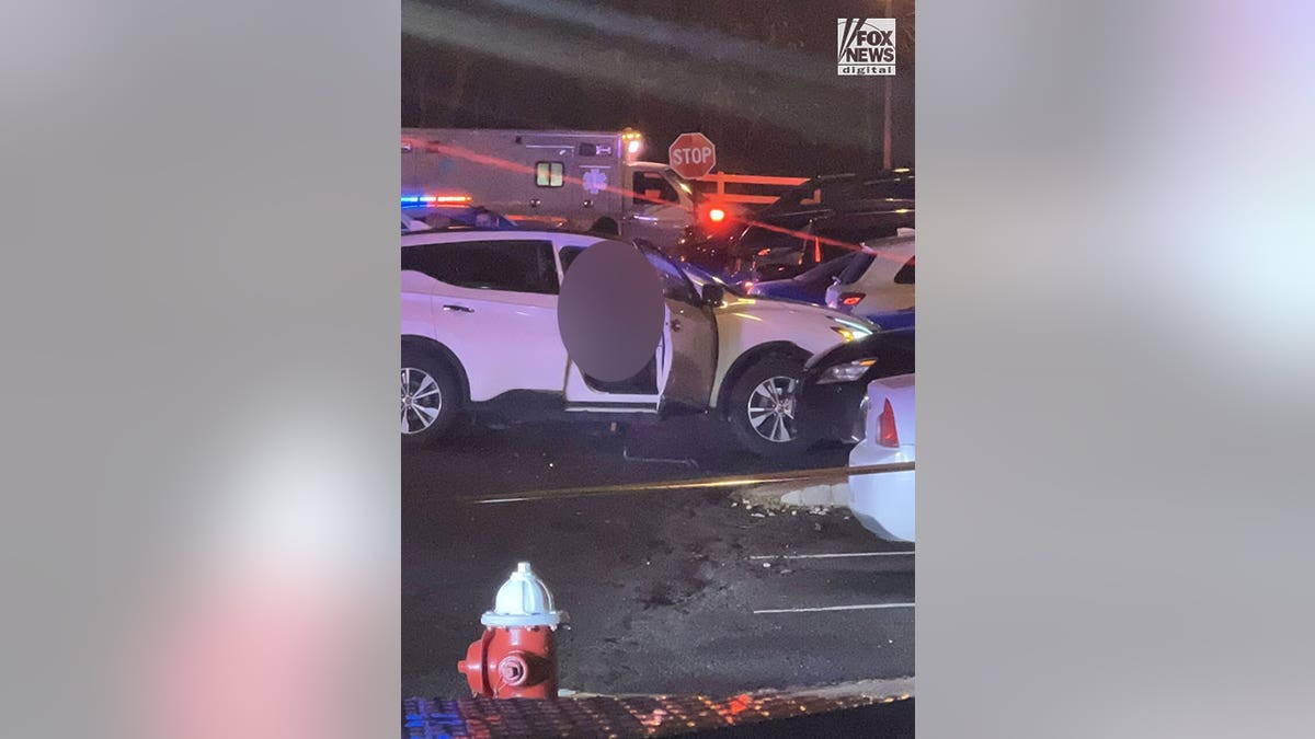 Damaged car at crime scene