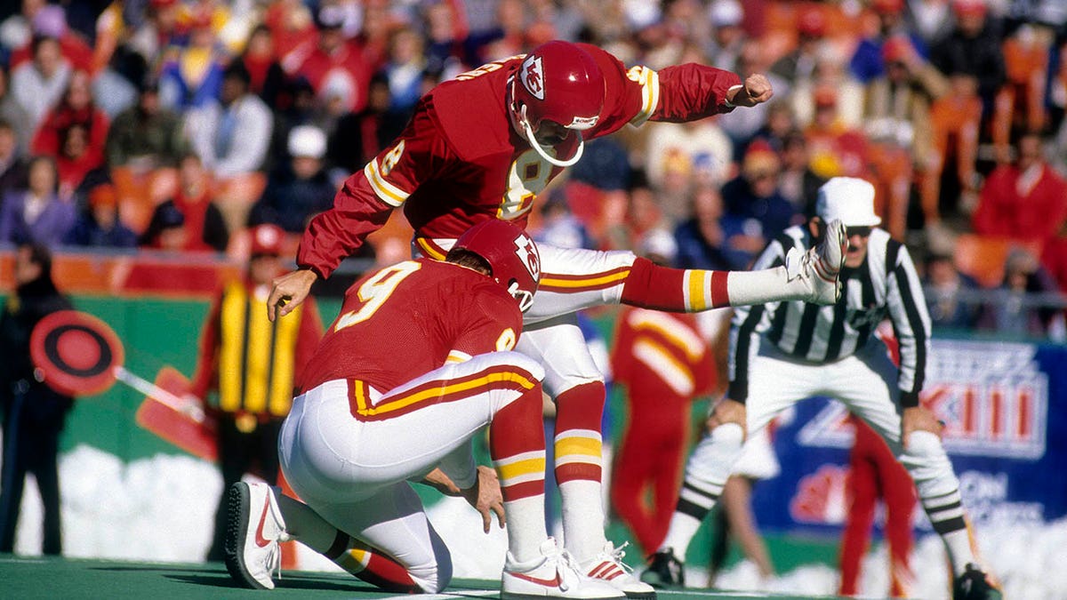 Nick Lowery kicks a field goal during an NFL game in 1993