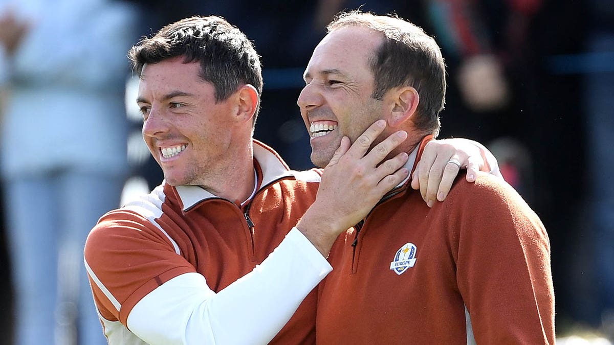 Sergio Garcia and Rory McIlroy of Europe celebrate victory