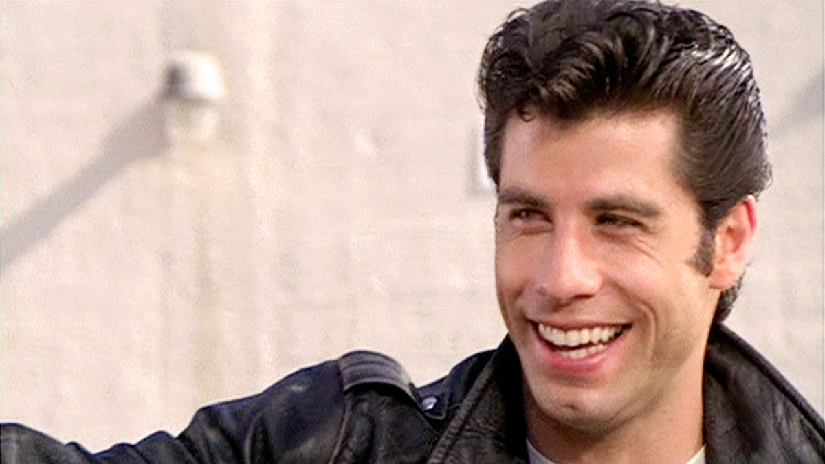 John Travolta as Danny Zuko on Grease