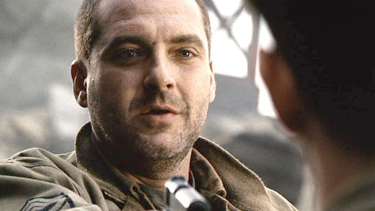 Tom Sizemore pointing a gun in a scene for "Saving Private Ryan"