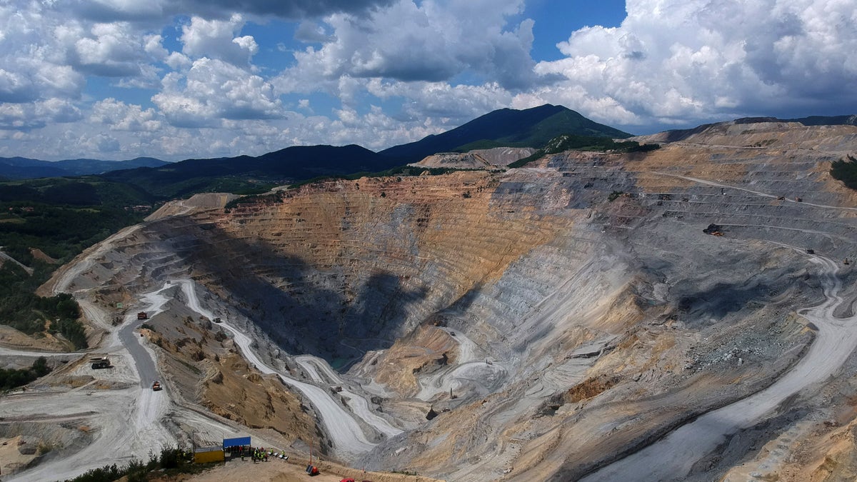 The excavated terrain of the Veliki Krivelj open pit copper mine, operated by Zijin Mining Group Co., in the Bor Region, Serbia, on Friday, June 11, 2021. Chinas Zijin Mining Group is stepping up investments in Serbia, including through acquisition of mineral resources. Photographer: Oliver Bunic/Bloomberg via Getty Images