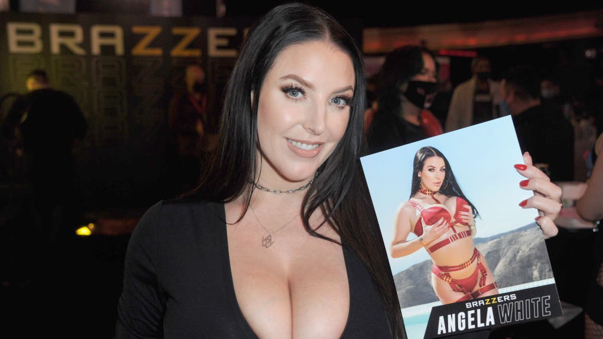 Adult film star Angela White on red carpet at awards show