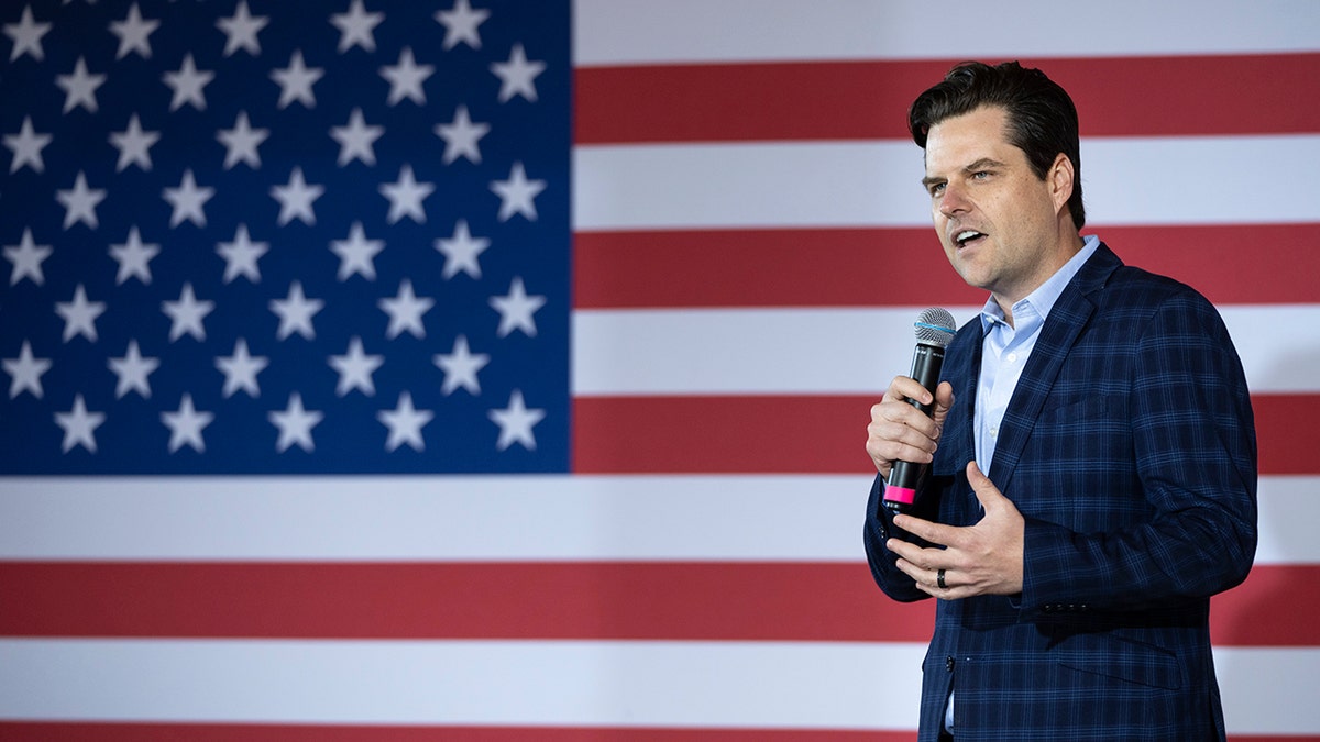 Matt Gaetz in front of an American flag