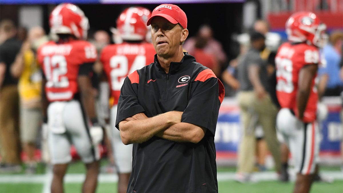 Todd Monken looks on before a game against Oregon