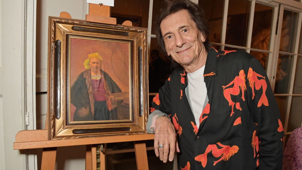 ronnie wood with painting