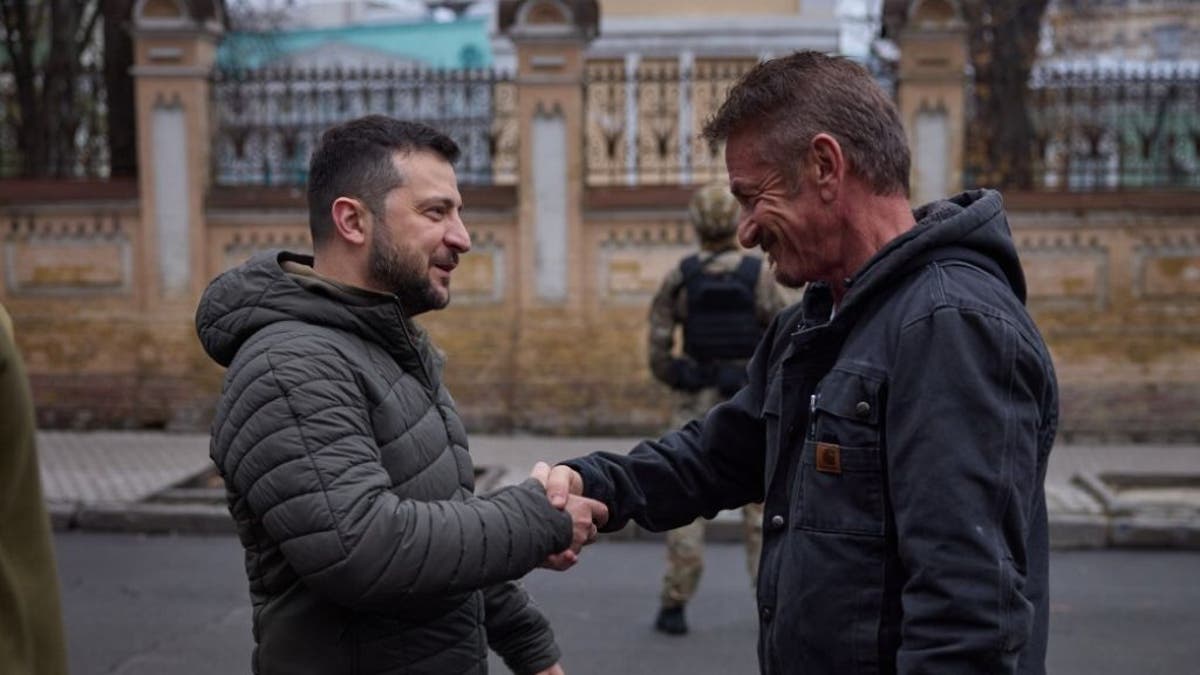 penn zelensky shake hands