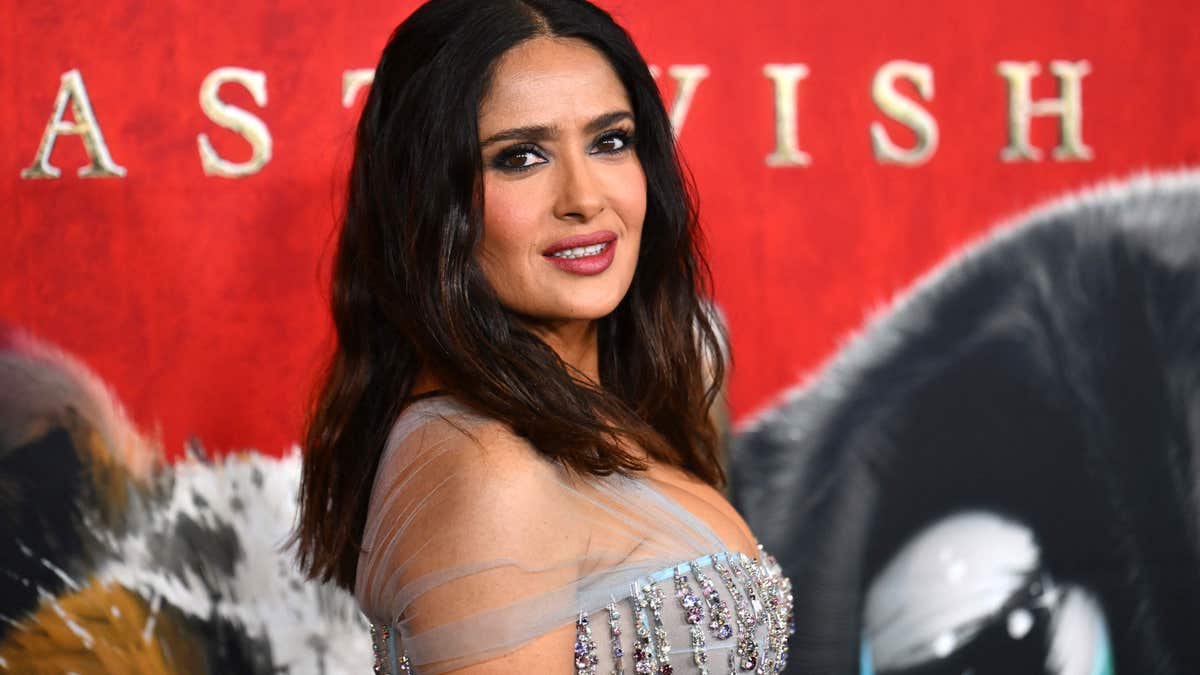 Salma Hayek looking over shoulder at red carpet premiere