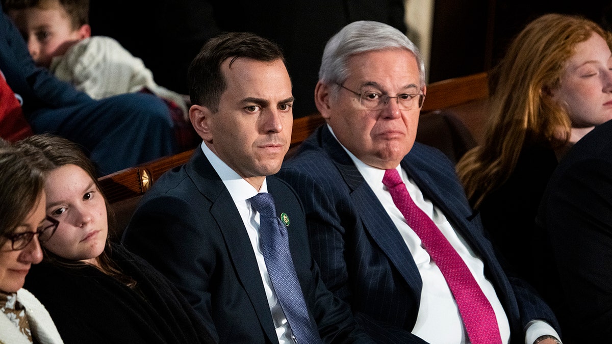 Bob Menendez sitting with his son