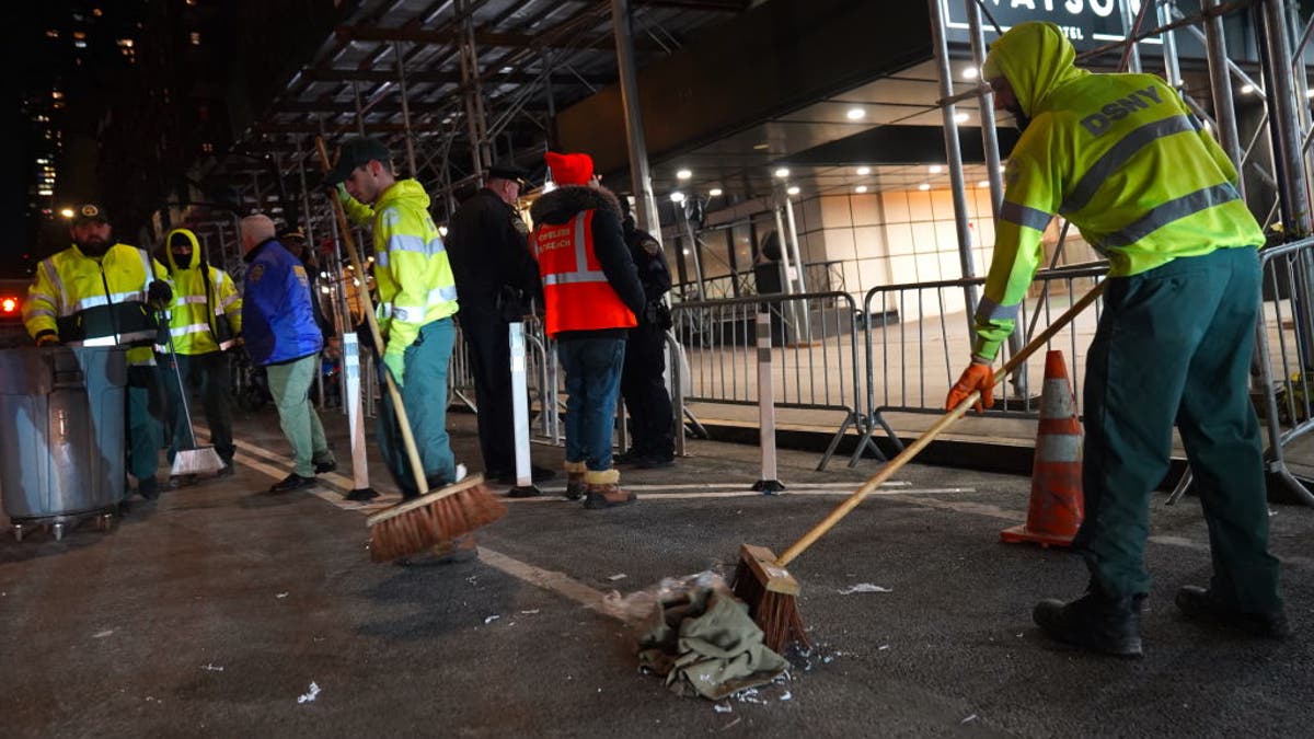 NYC workers cleaning site