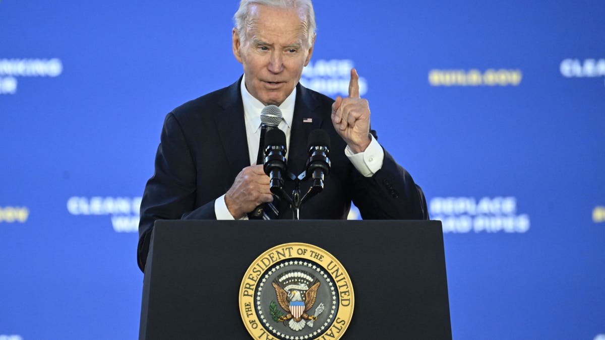 President Biden speaking at a podium 