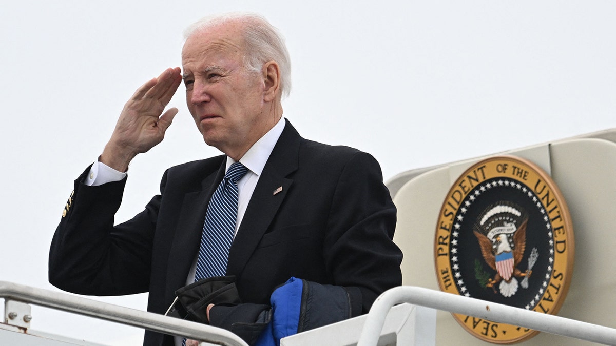 Joe Biden saluting