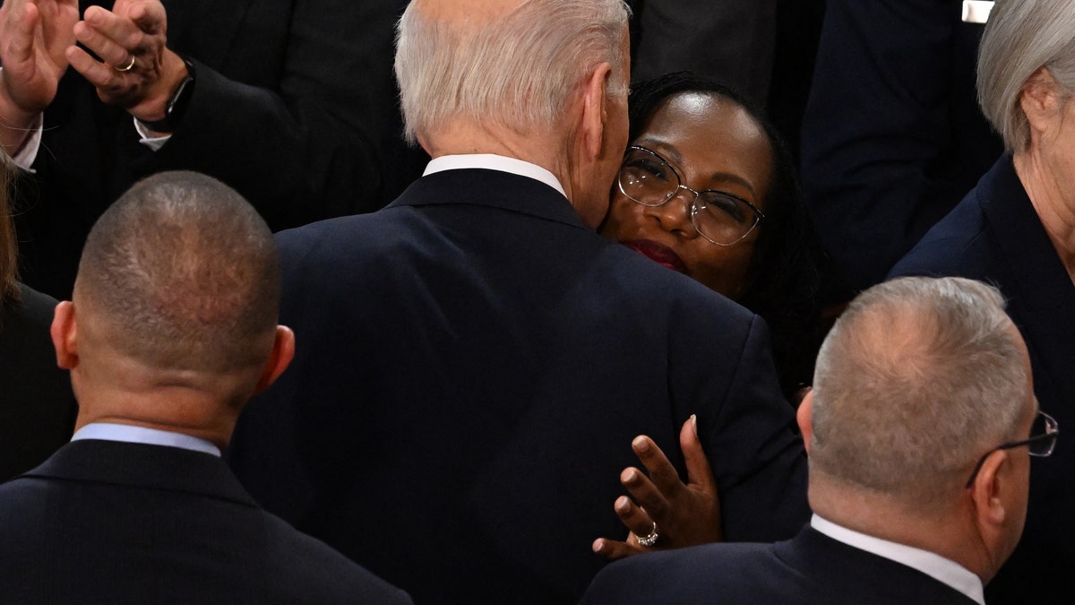 US President Joe Biden greets US Supreme Court Associate Justice Ketanji Brown Jackson as he arrives to deliver the State of the Union address in the House Chamber of the US Capitol in Washington, DC, on February 7, 2023. (Photo by Jim WATSON / AFP) (Photo by JIM WATSON/AFP via Getty Images)