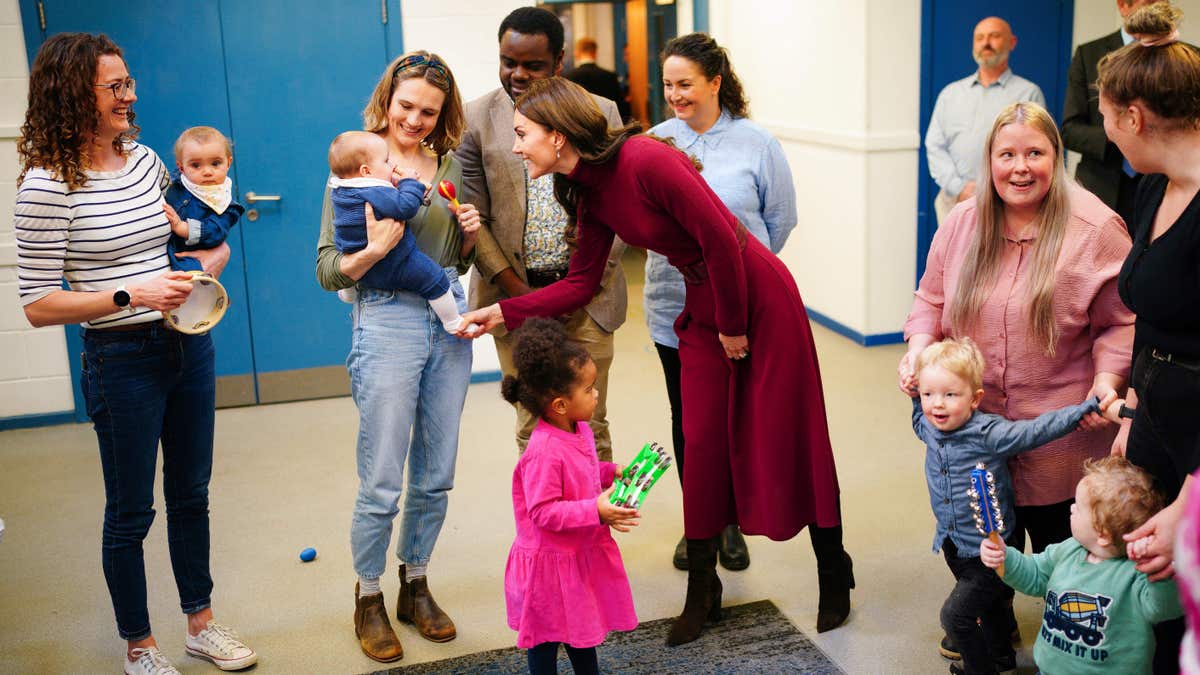 Kate Middleton speaking to children