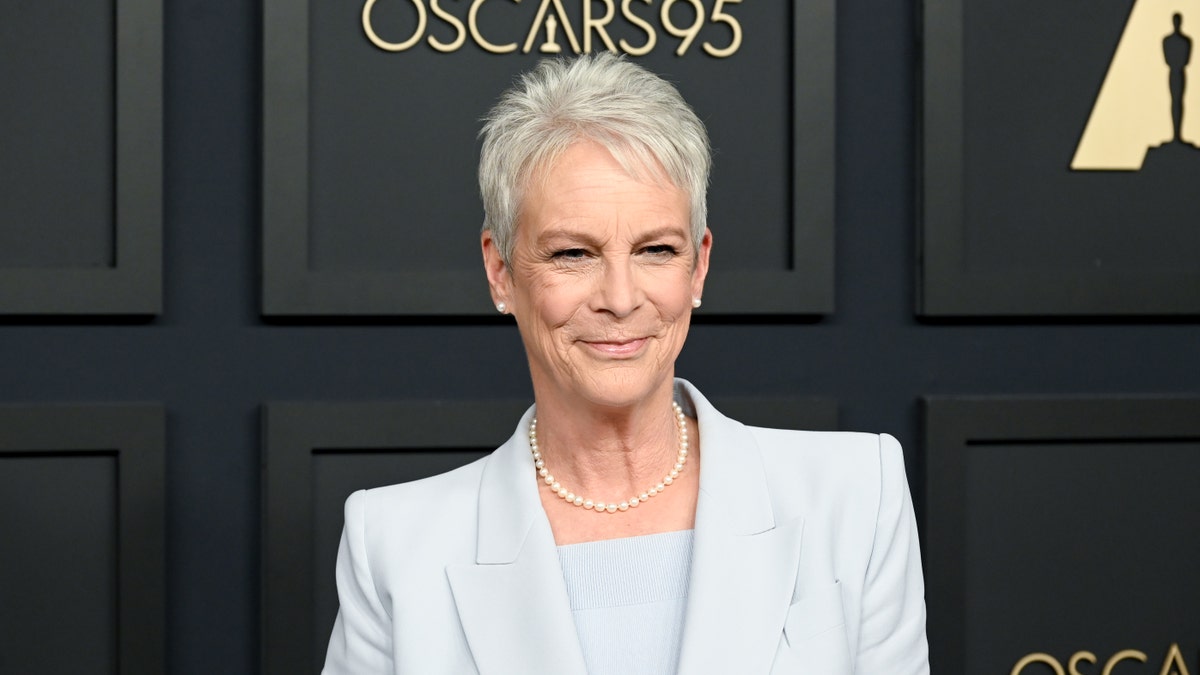 Jamie Lee Curtis wears a light blue suit