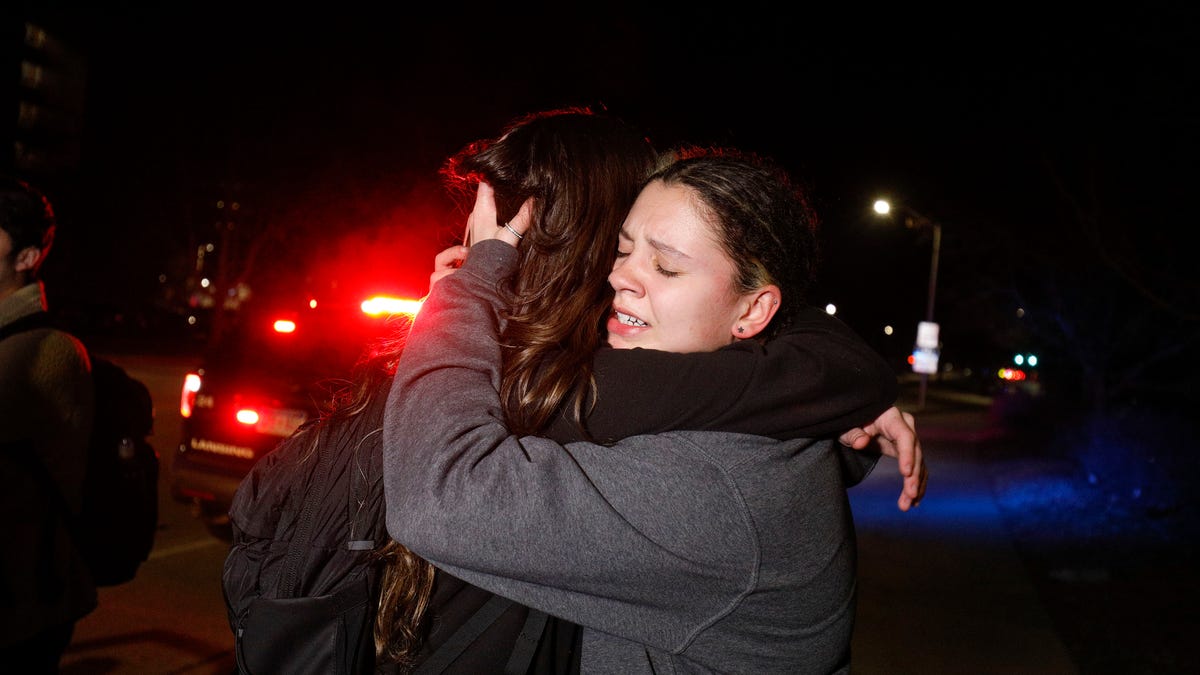 Michigan State students hug after shooting on campus