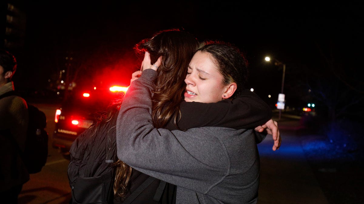 Michigan State students hug after shooting on campus