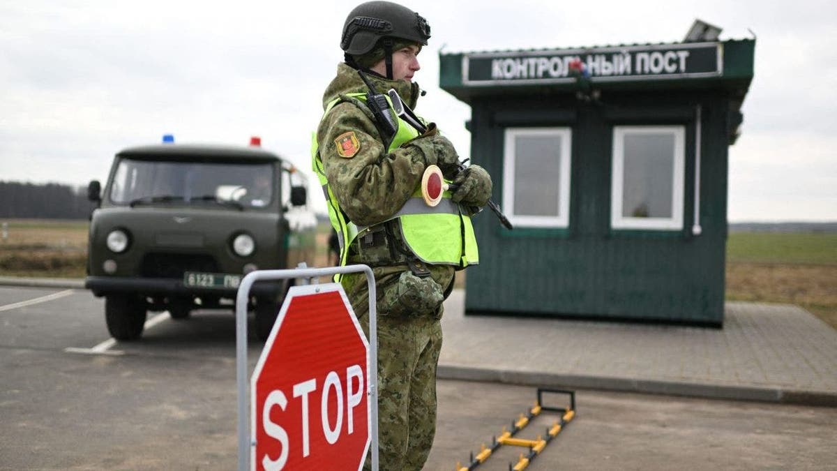 A soldier guards the border of Belarus and Ukraine