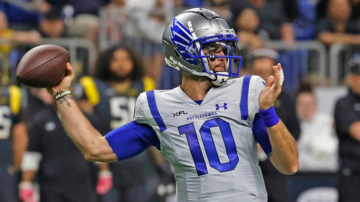 A.J. McCarron throws a pass during an XFL game