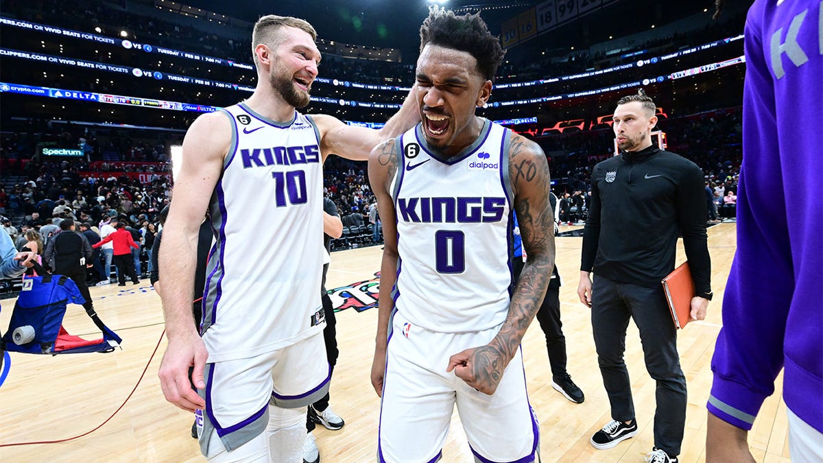 Malik Monk celebrates after beating the Clippers