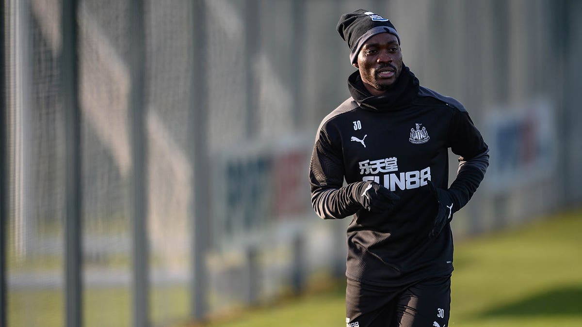 Christian Atsu runs during a training session for Newcastle United