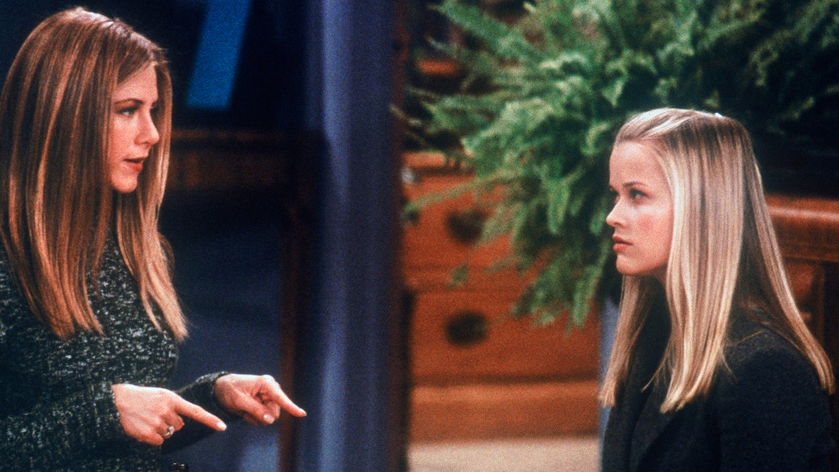 Jennifer Aniston as Rachel Green and Reese Witherspoon as Jill Green have a stare down on an episode of "Friends'