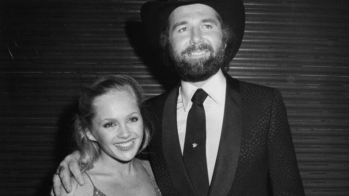 Charlene Tilton and singer Johnny Lee attending 10th Annual American Music Awards