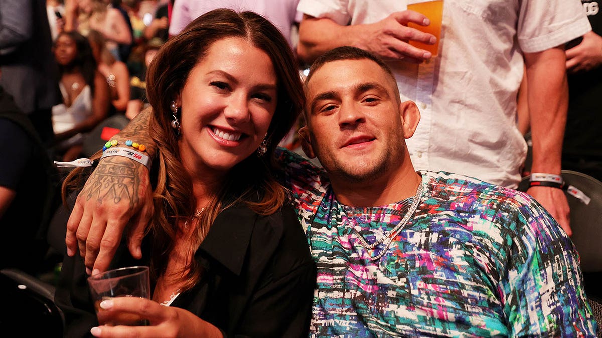 Dustin Poirier and his wife Jolie Poirier attend UFC 276