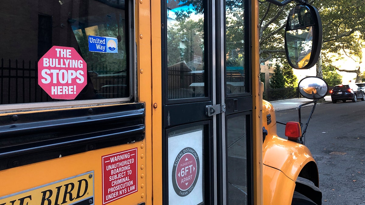school bus makes stop in NYC