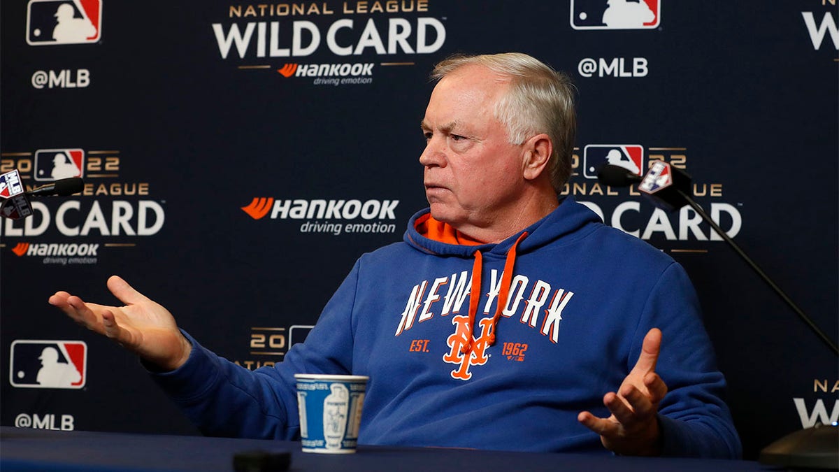 Buck Showalter speaks with the media in October