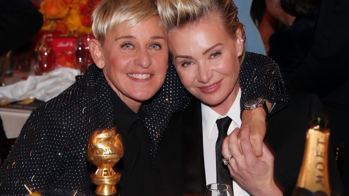 Ellen DeGeneres and Portia de Rossi at the 77th Annual Golden Globes