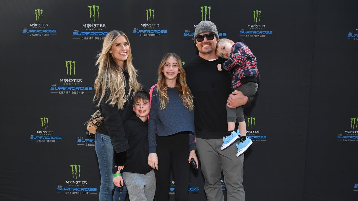 Christina Hall poses with her children and husband Joshua Hall