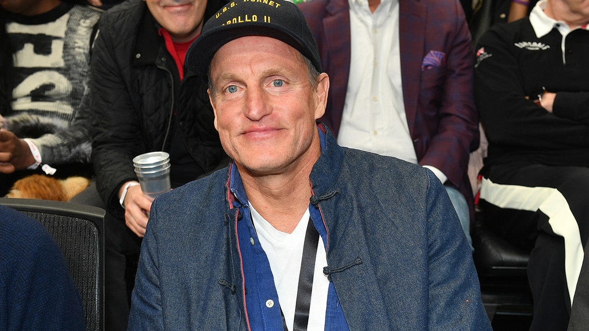 Woody Harrelson sitting