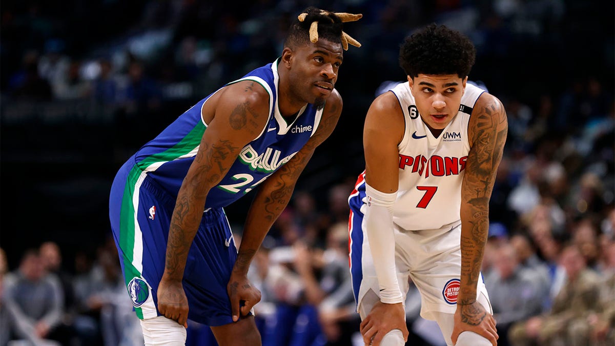 Reggie Bullock and Killian Hayes play against each other