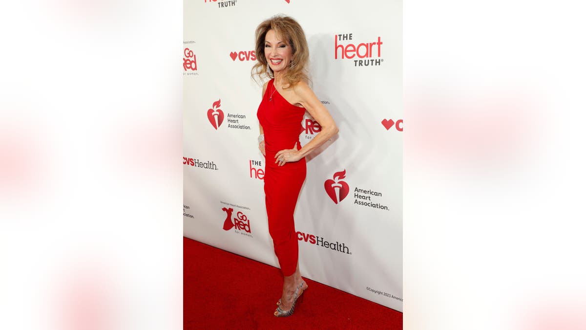 Susan Lucci wearing a red dress on the red carpet