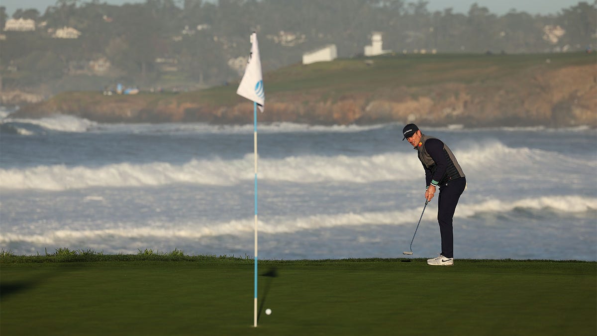 Justin Rose putts at the Pebble Beach Pro-Am