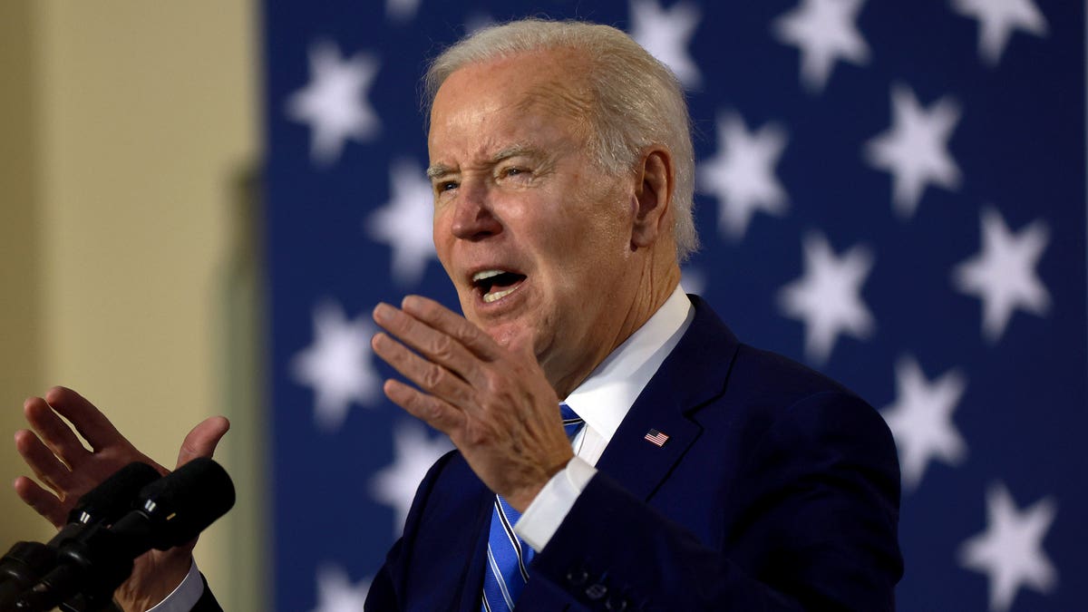 Biden gesturing and speaking