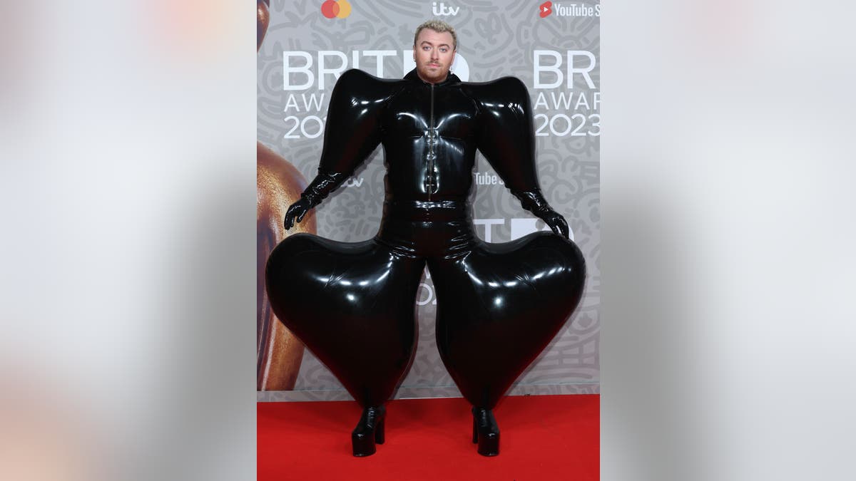 Sam Smith black blow up outfit