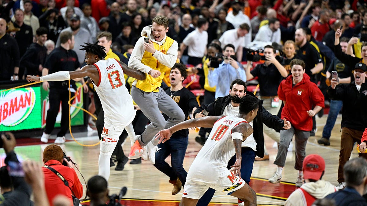Maryland celebrates with fans after beating Purdue