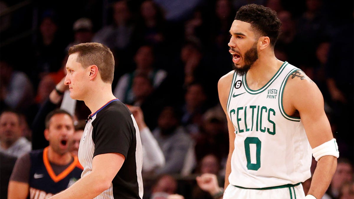 Jayson Tatum reacts after being ejected