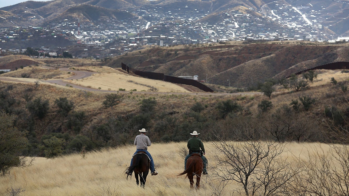 Border patrol ride horses near Nogales