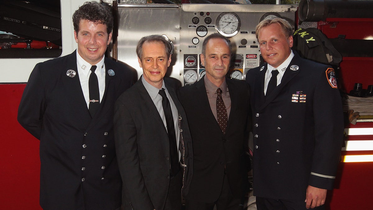 Steve Buscemi and firemen at the premiere of "A Good Job: Stories Of The FDNY" in New York