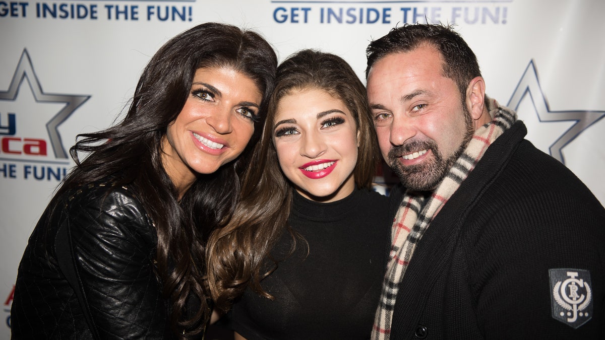 Teresa Giudice, Gia Giudice and Joe Giudice pose together