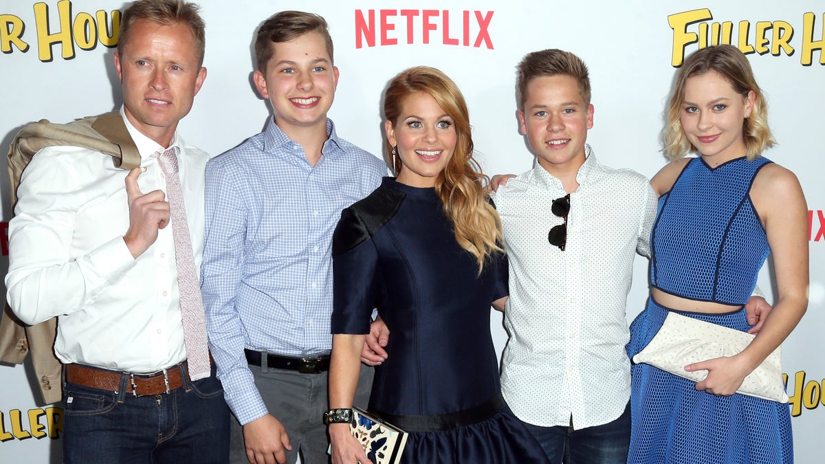 Valeri Bure, Lev Valerievich Bure, actress Candace Cameron-Bure, Maksim Valerievich Bure, and Natasha Valerievna Bure attend the premiere of Netflix's "Fuller House"