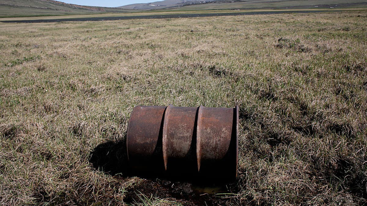 A lone oil barrel is pictured near the Kokalik river, which winds through the National Petroleum Reserve in northern Alaska. (Andrew Lichtenstein/Corbis via Getty Images)