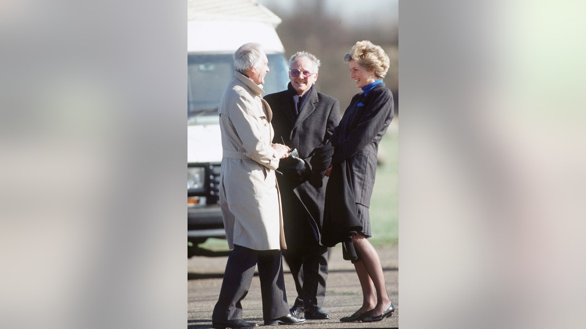 Princess Diana laughing with Dickie Arbiter