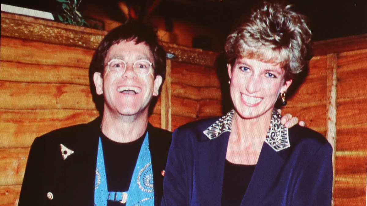 A photo of Elton John having a laugh with Princess Diana