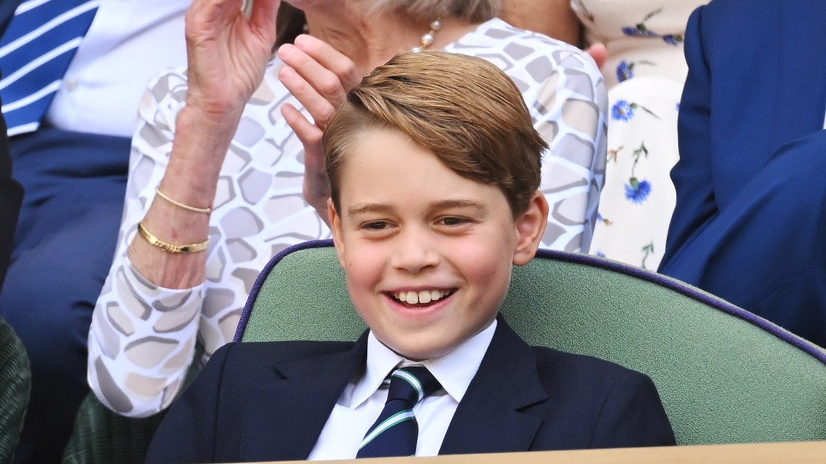 Prince George smiling while watching the festivities of the Platinum Jubilee