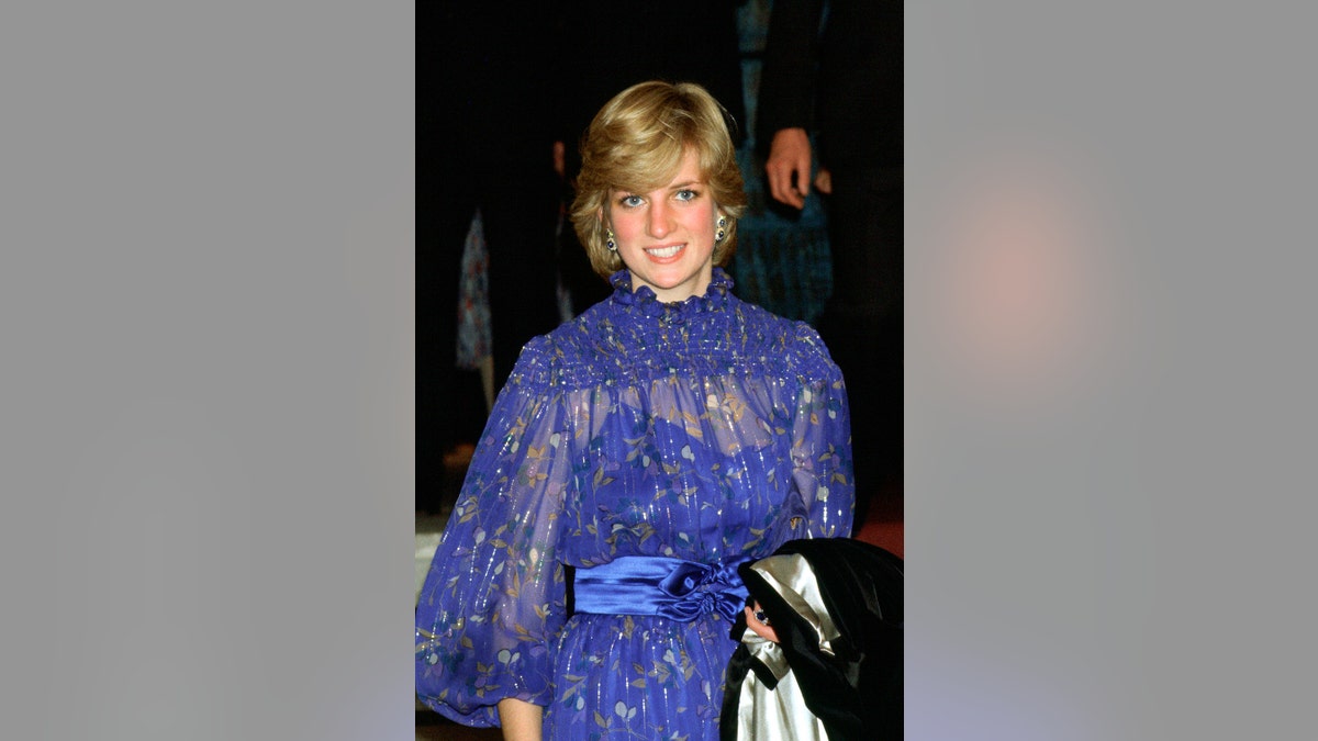 Princess Diana wearing a bright blue dress